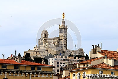 Virgin Mary on Notre Dame de la Garde bell tower in Marseille Stock Photo